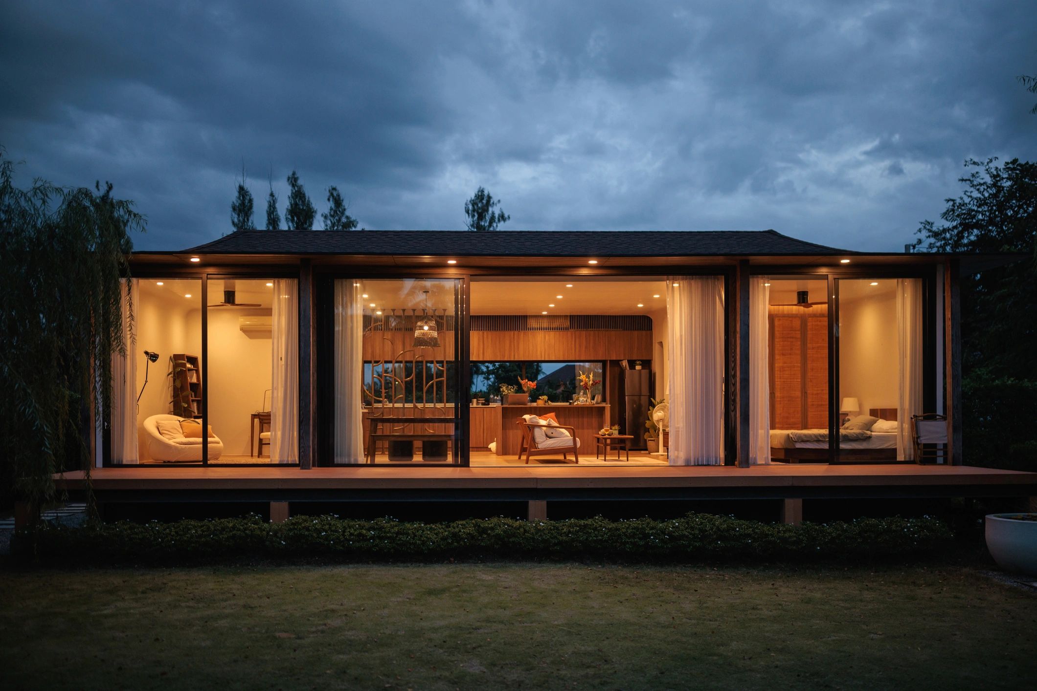 High-end residential renovation exterior at dusk