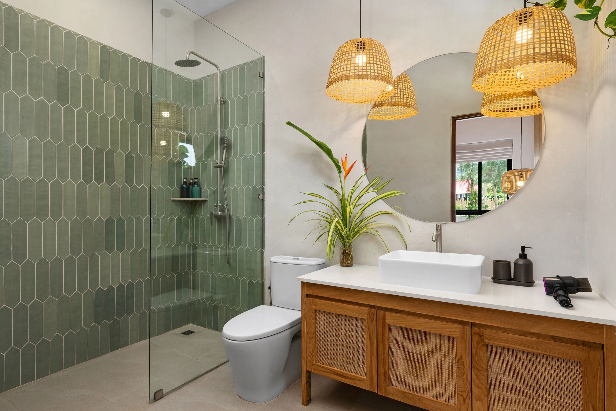 Modern bathroom renovation with walk-in shower and wood vanity